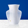 Perforated white cover vase