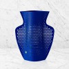 Perforated blue paper-vase