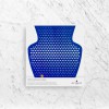 Perforated blue paper-vase